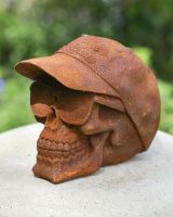 side view of rustic finish cast iron outdoor statue