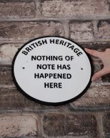 Humorous Cast Iron Wall Sign - “Nothing of Note has Happened Here” with hand to reference scale