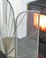Close-Up of Silver "Art Deco" Three-Fold Fireguard Close-Up of Silver "Art Deco" Three-Fold Fireguard