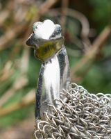 Close-Up of Silver Rooster Wire Sculpture