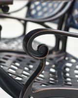 Ornate Curved Armrest on the Chair
