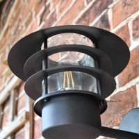 View of the Contemporary Lid on the "Skive" Wall Light