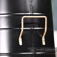 close-up of the Polished Brass Handle so the coal Hod