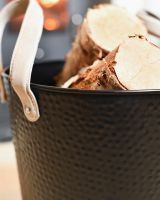 Close-Up of Small Black Contemporary Dotted Log Basket