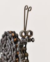 Close up of face detail on scrap metal art sculpture