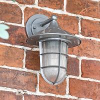 Top Fix Wall Lantern Finished in a Glossy Silver Finish Top Fix Wall Lantern Finished in a Glossy Silver Finish