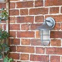 "South Shore" Silver Standard Top Fix Wall Lantern on a Garden Wall "South Shore" Silver Standard Top Fix Wall Lantern on a Garden Wall