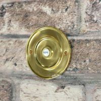 Sovereign Park Polished Brass Classic Bell Push On Brick Wall