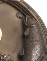 Close up of fish on house number plaque Close up of fish on house number plaque