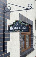 Hand Painted Bramble House Sign Mounted onto Wall Hand Painted Bramble House Sign Mounted onto Wall