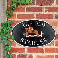 Show Jumper Cast Iron House Name Sign on Brick Wall