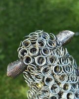 Close up of back of Rustic Bedspring Sheep Sculpture head Close up of back of Rustic Bedspring Sheep Sculpture head