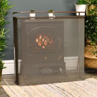 Stainless Steel Double Rail Fire Guard in Situ Next to the Fireplace