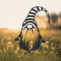 Gonk Gnome With Stripy Hat Silhouette in Use in a Field