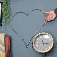 Scale Shot of Steel Heart Hanging Wall Art