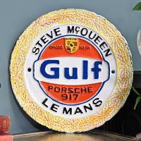 Steve McQueen "Gulf" Cast Automobilia Reproduction Sign in Situ Next to a Blue Wall Steve McQueen "Gulf" Cast Automobilia Reproduction Sign in Situ Next to a Blue Wall