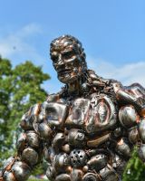 Close up of intricate sculpted detail of recycled metal art sculpture