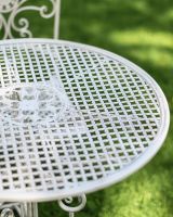 Close-Up of Circular Table for Stunning Sunrise Outdoor Two Seater Bistro Set with Spiral Detailing