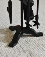 Close up of freestanding base and tools on fireside companion set