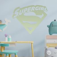 "Supergirl" Wall Art on a Grey Wall "Supergirl" Wall Art on a Grey Wall