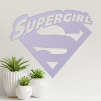 "Supergirl" Wall Art on a Cream Wall "Supergirl" Wall Art on a Cream Wall
