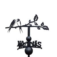 Swallow weathervane on a white background