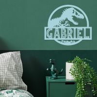 T-Rex Steel Monogram Steel House Name Sign on Situ on a Green Wall T-Rex Steel Monogram Steel House Name Sign on Situ on a Green Wall