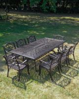 The "Verona " 8-Seater Luxury Garden Dining Set - Antique Copper Digital Illustration Scale Shot In A Garden