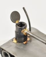 Close up of intricate detail on recycled metal art sculpture