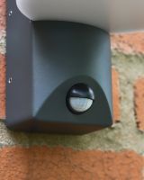 Close up of sensor detail on garden wall light