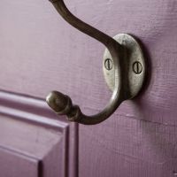 The 125mm Ironmonger Acorn Orange Ceramic Coat Hook Showing a Close up of the Rounded Lower Hook - Digital Illustration
