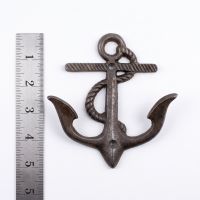 The 130mm Maritime Double Anchor Rope Coat Hook in Antique Iron On a White Background  with a Ruler for Scale - Digital Illustration