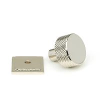 The 25mm Knurled Cabinet Knob on a Square Rose in Polished Nickel Displayed in Separate Sections on a White Background The 25mm Knurled Cabinet Knob on a Square Rose in Polished Nickel Displayed in Separate Sections on a White Background