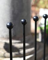 The 4-Pair Welly Boot Rack Stand Showing a Close up of the Ball Finial spokes