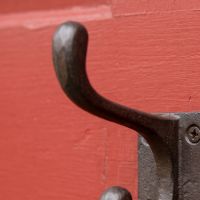 The 90mm Compact Cotswold Antique Iron Coat Hook Showing a Close up or the Upper Hook - Digital Illustration