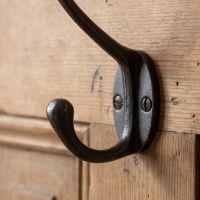 The Blacksmith Antique Iron Two-Prong Coat Hook - 110mm Showing the Lower Hook up Close