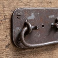The Blacksmith Industrial Chest Drop Handle - 4" Showing a Close up of the Hinge Mechanism - Digital Illustration