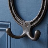 The Blacksmith Vintage Cast Iron Horseshoe Robe Hook Showing a Close up of the Double Hook - Digital Illustration