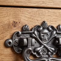 The Cast Antique Iron Skull & Crossbones Drop Handle - Antique Iron Finish Showing the Screw Fitting - Digital Illustration