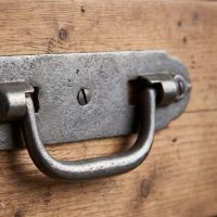 The Cotswold Backplate Drop Handle Showing a Close up of the Arched Handle - Digital Illustration