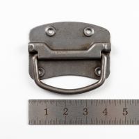 The Cotswold Heavy Duty Trunk Drop Handle on a White Background next to a Steel Ruler for Scale - Digital Illustration