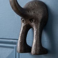 The Dog Tail Coat Hook in Cast Antique Iron - 115mm Showing a Close up of the Tail - Digital Illustration