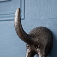 The Dog Tail Coat Hook in Cast Antique Iron - 115mm Showing a Close up of the Tail - Digital Illustration