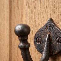 The Forge Antique Iron Single Peg Wall Hook Showing a Close up of the Tip of the Hook - Digital Illustration
