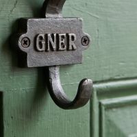 The GNER Railway Double Coat Hook in Cast Antique Iron Showing a Close up of the Lower Hook - Digital Illustration