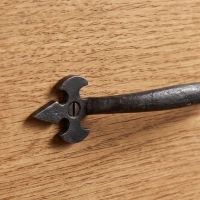 The Gothic Fleur-de-Lis Bow Handle - 157mm Showing a Close up of the Fleur-de-Lis - Digital Illustration