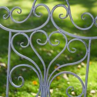 The Grey "Belvedere" Wrought Iron Garden Bench Showing the Heart Shaped Backrest