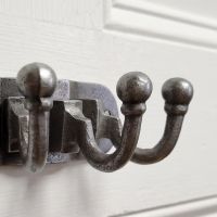 The Hawthorn Triple Coat Hook in Cast Antique Iron - 35 x 90mm Showing a Close up of all Three Hooks - Digital Illustration
