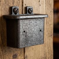 The Inn Cast Iron Bottle Cap Catcher Showing a Close up of the Cap Catcher