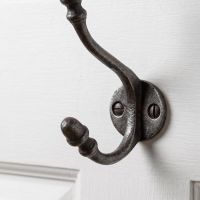 The Ironmonger Acorn Rose Red Ceramic Coat Hook - 125mm Showing a Close up of the Lower Hook Acorn Design - Digital Illustration